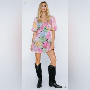 Brand New Nasty gal dress. Super cute with boots or sandals.